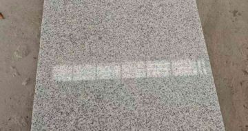 哈密芝麻白光面毛板