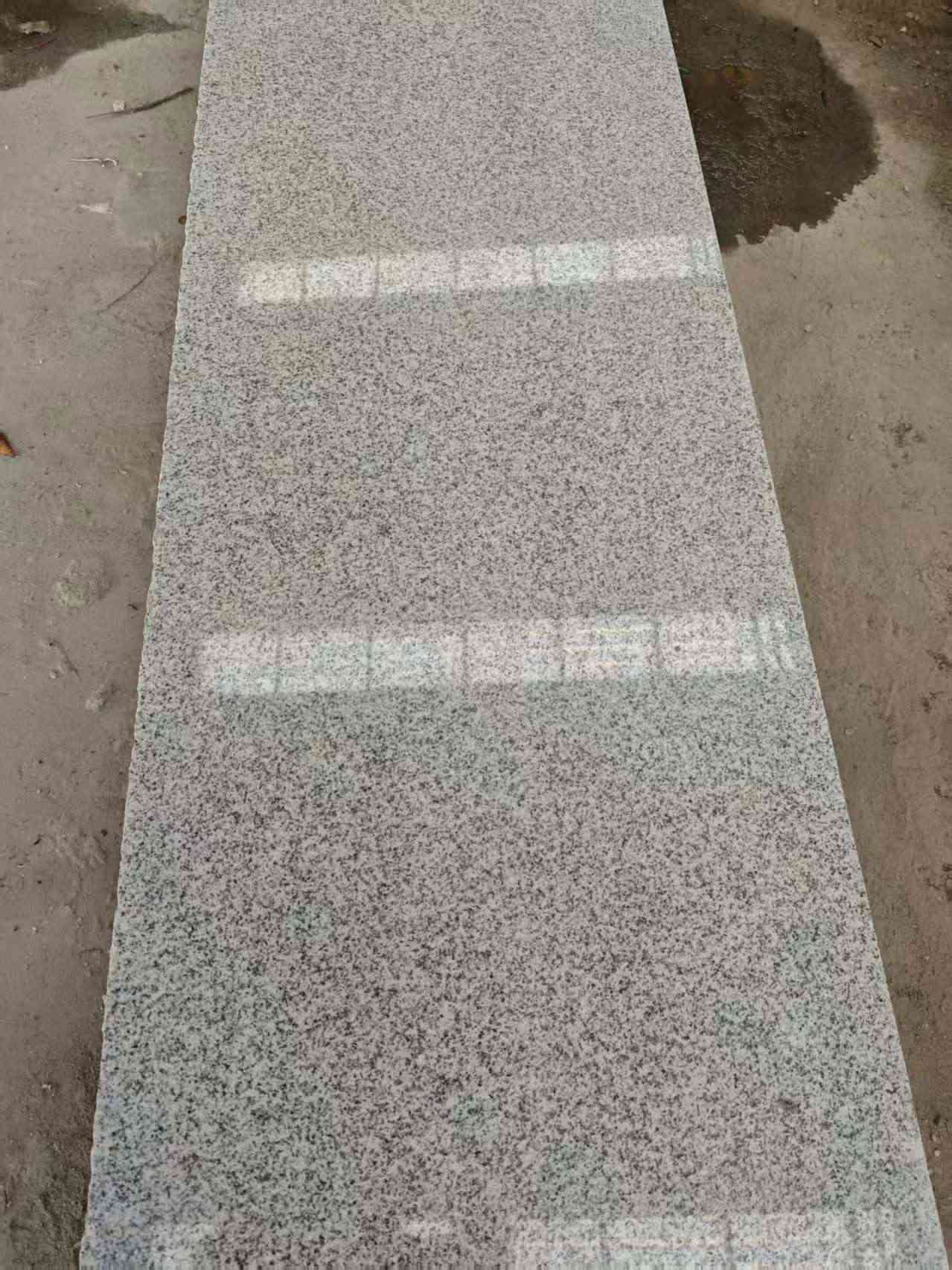 哈密芝麻白光面毛板